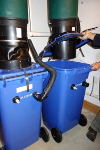 Fig. 2: Installation of a new empty bin to the chute