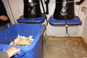 Fig. 1: Removal of a full bin from the chute